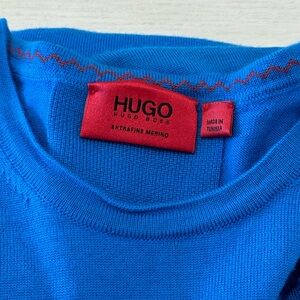 Like-new blue Hugo Boss long-sleeve sweater made from premium Merino wool